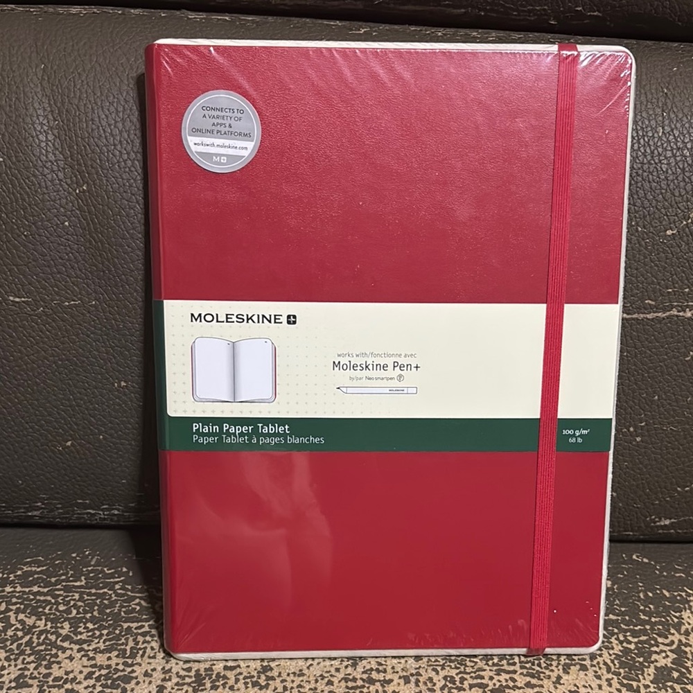 Moleskine hardcover Tablet red notebook.